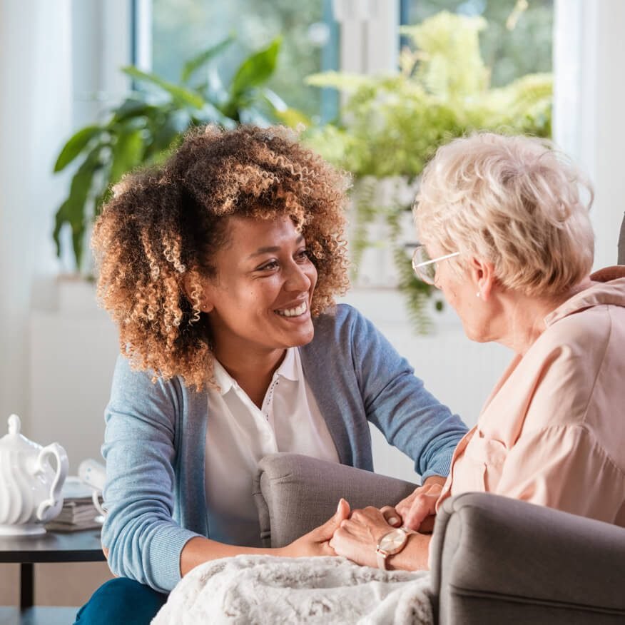 Caregiver spending time with a resident